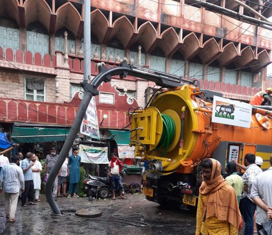 Suction Truck being used to clear the water logging at Mohalla Kishan Ganj, Imli Wali Masjid, Old Delhi